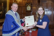 Elise Hammond accepts her Air bp Sterling Pilot Scholarship Award from Nick Goodwyn, Immediate Past 