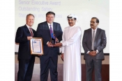 Gary Garner, EVP Group Services, Chris Tabet, Air BP receiving award from HE Jamal Al Hai, Deputy CE