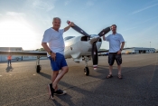 Left to right - Mike Roberts and Nicholas Rogers with the Piper Malibu