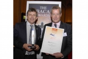  Peter Alfred, Operations Director at Transvalair UK hands the Best Cargo Airline award to Jota Avia